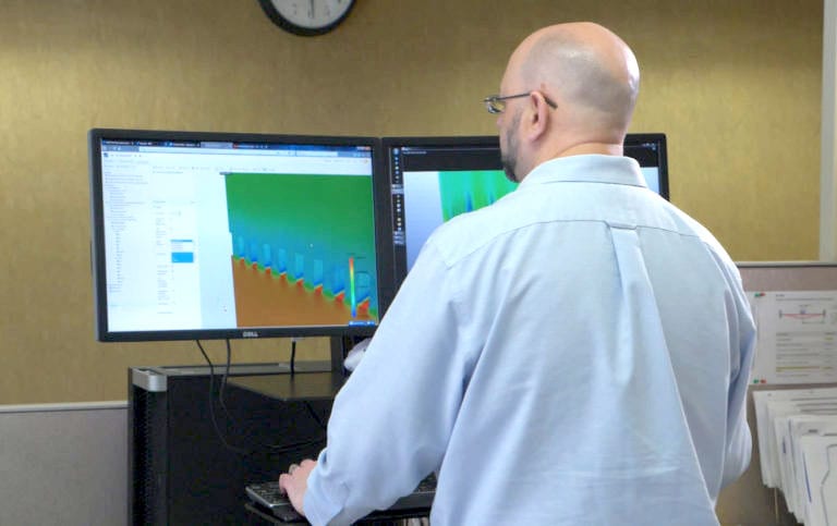 Daryn working on the project using SimScale