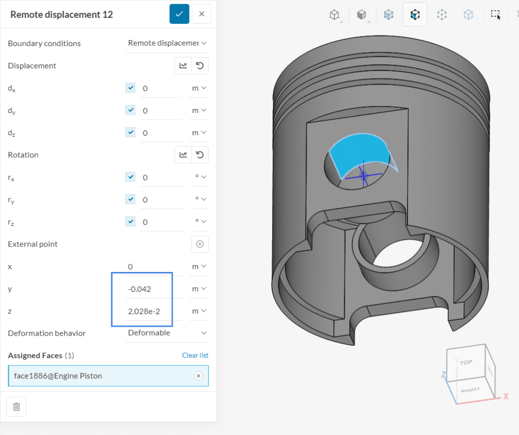 remote displacement applied at the top side of the piston pin with external point coordinates of 0,-0.042, 0.02028