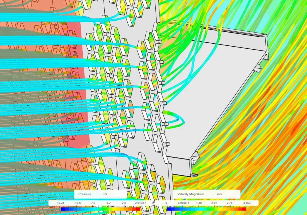 A close-up of simulated airflow through the perforated sheet and over the louver fins
