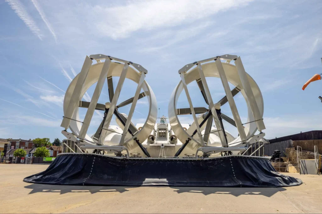 a close-up of the propellers (5 blades rotating) and rudders (4 blade moveable aluminium rudders)