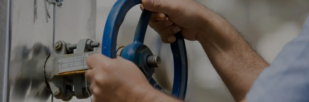 Valve simulation software header image - a hand turning open a valve