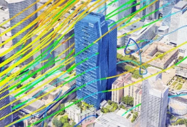 CFD simulation showing wind flow patterns around buildings in an urban environment