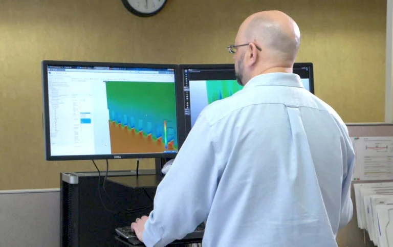 Daryn working on the project using SimScale