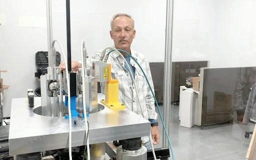 Phillip Lentz, CEO of UNSPACE, with the gravitational detector.