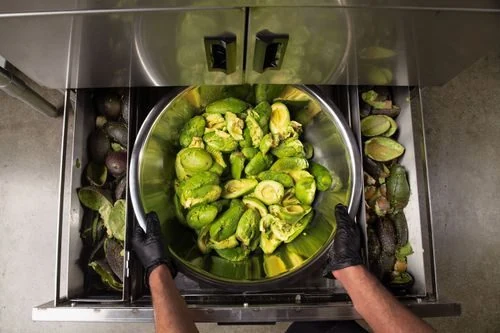 stainless steel bowl with the processed avocados